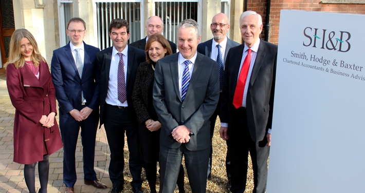 Firm joins business services group