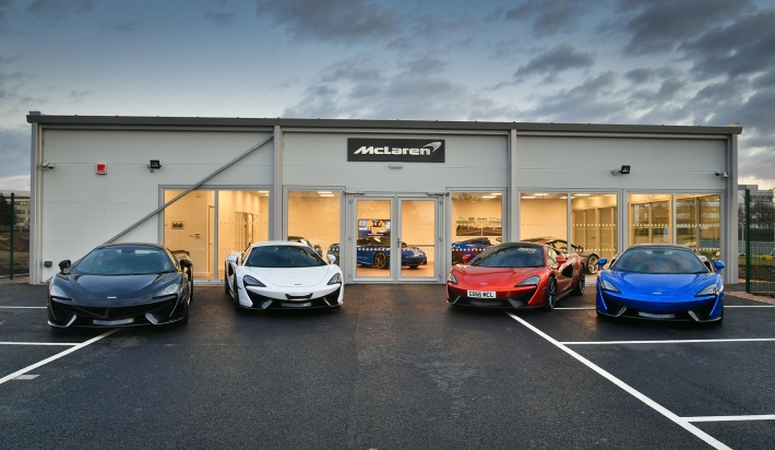 In the driving seat with temporary car showroom technology